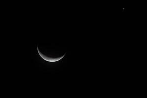 A Lunar eclipse occurs with dark sky when the Moon passes directly behind the Earth photo