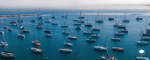 Aerial View of Marina with Sailboats in Monterey, California photo
