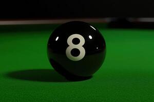 A single black snooker ball sits precariously on the edge of a vibrant green felt table, illuminated softly in a dimly lit environment, reflecting the anticipation of the game ahead. photo