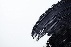 Bold brush marks in black create striking contrast on a clean white canvas, showcasing an expressive and modern artistic design. This artwork invites contemplation and creativity. photo