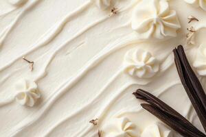 A smooth layer of vanilla frosting features beautiful swirls and decorative accents, complemented by vanilla bean pods, creating a minimalist and inviting dessert display. photo