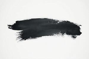 A bold black brush mark stretches across a clean white canvas, demonstrating an artistic expression that contrasts sharply with the background, evoking a sense of modern minimalism and creativity. photo