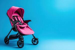 Bright pink baby stroller accessories rest on a clean solid blue background, showcasing modern design and functionality. Perfect for parents looking to enhance their childs comfort and safety. photo