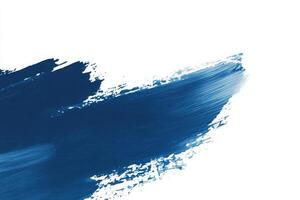 Dynamic blue brush strokes elegantly sweep across a pristine white canvas, showcasing an artistic expression and vibrant color contrast that captures attention and evokes creativity. photo