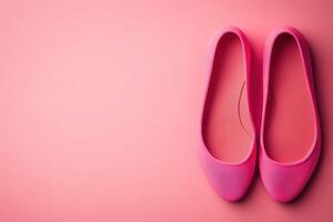 These chic ballet flats, displayed in a vibrant pink color, showcase a minimalist design ideal for casual wear. The clean solid background emphasizes their stylish appeal and versatility. photo