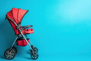 A compact baby buggy stands out against a clean blue backdrop, showcasing its vibrant red color and practical design, ideal for parents seeking convenience and style for their little ones. photo