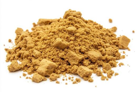 A mound of graham cracker crumbs sits isolated against a white background, showcasing its fine texture and light brown color, perfect for various dessert recipes and baking applications. photo