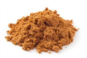 A generous mound of graham cracker crumbs sits isolated on a white surface, ideal for various baking recipes, crusts, and desserts. This versatile ingredient adds sweetness and texture to dishes. photo