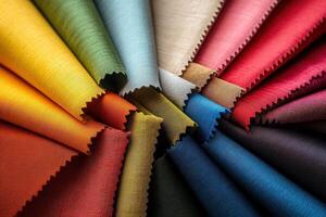 A variety of colorful fabric swatches arranged in a clean and minimalist layout highlight solid designs. The swatches include diverse shades, perfect for various design projects and inspiration. photo