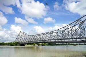 A View of Howrah bridge and Holy Ganga River from Mullick Ghat photo