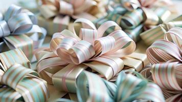 Low-angle abstract shot of colorful gift wrapping, ribbons, and bows scattered in a dynamic pattern photo