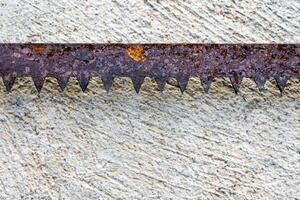 The sharpness of saw blade is old and rusty photo