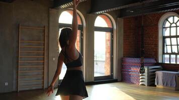 Ballerina Dances in Sunlit Loft Gym, Sunset Rays Casting a Warm Glow on Scene video