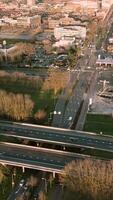 Aerial view of a highway and city with traffic video