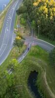 Aerial view of a road with a bridge and a river video