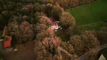 Aerial view of a house surrounded by trees video