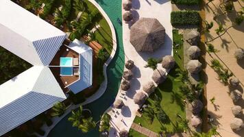 Top aerial view of a luxury resort on the coast of the Dominican Republic. A popular exclusive resort. A beach with golden sand. Paradise tropical nature, exotic holidays, vacations, travel. video