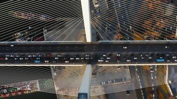Top down view on the road with dense traffic of the cable-stayed bridge video