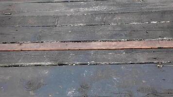 Weathered, rustic wooden planks form a textured background, ideal for autumn or countryside themes video