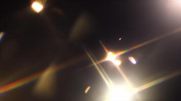 A close up of a bright light shining on a dark background video