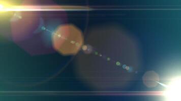Abstract light rays and lens flare on a dark background video