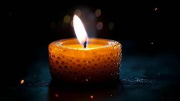 a burning candle on a dark background video
