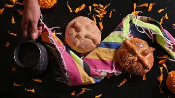 Pan de Muerto. Typical Mexican sweet bread that is consumed in the season of the day of the dead. It is a main element in the altars and offerings in the festivity of the day of the dead. video