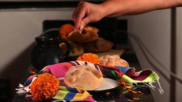 Pan de Muerto. Typical Mexican sweet bread that is consumed in the season of the day of the dead. It is a main element in the altars and offerings in the festivity of the day of the dead. video