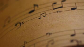 Dolly Move of Music Notes on Vintage Paper Creating a Timeless Artistic Vibe video