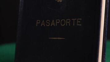 Blue Spanish passport rotating on turntable, official travel document close-up 2 video