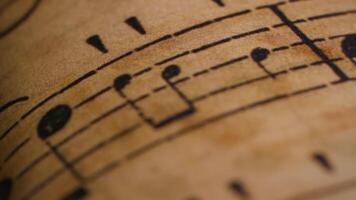 Dolly Move of Music Notes on Vintage Paper Creating a Timeless Artistic Vibe video
