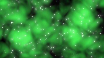 Green color glowing flickering star cloud textured abstract design loop able particles background video