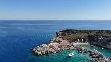 Drone View of Yachts Moored Near Island with Tourists Swimming on a Sunny Day video