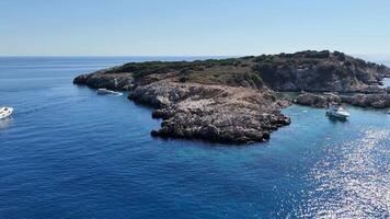 Drone View of Tourist Yachts by Island with Swimmers in Clear Turquoise Waters video