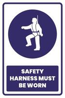 A blue and white sign with the words safety harness must be worn vector
