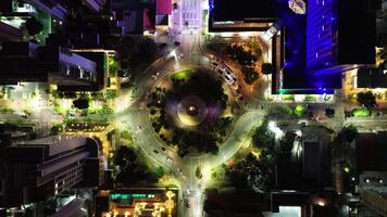 Aerial view of night traffic around a circular square video