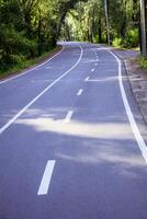 A road with white lines on it photo