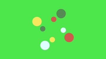Four dots moving rotating animation. colorful circles on green screen. smooth motion. video