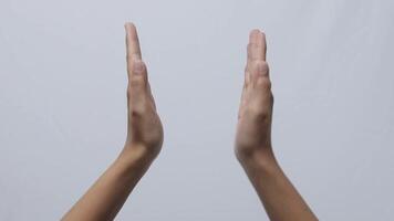 Applause, A Close up shot of hands clapping on white background video
