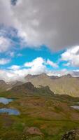 Nature or landscape vertical time lapse . Moving clouds over the mountain tops and lakes. video