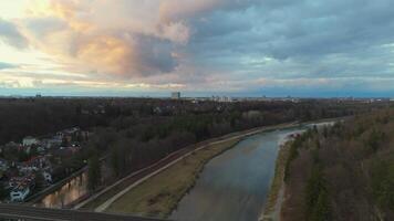Grosshesseloher Brucke on Isar River in Munich, Germany aerial view. Two-story railroad and pedestrian bridge in Munchen over Isar River. Eisenbahnbrucke. Bike path runs under Railroad tracks. video