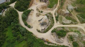 Aerial view of an abandoned mining quarry in Germany im Landkreis Dillingen. Open pit mines drone view. Steinbruch Luftaufnahme in Deutschland, Bayern in der Stadt Haunsheim. Mining equipment. video
