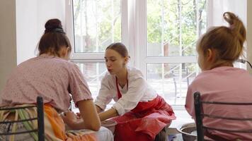 Pottery making workshop with participants in a sunny studio in fall video