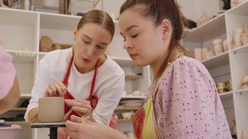 Guided pottery class in a cozy studio for beginners learning techniques video