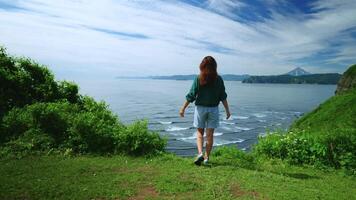 Young Woman Tourist Admiring Seascape From Mountains, Lady Putting Hands Up, Cinematic Back View video