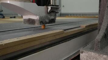 High-precision polishing machine is used to polish piece of metal that intended for use in furniture products. Dust and shavings may be present in air during process. video