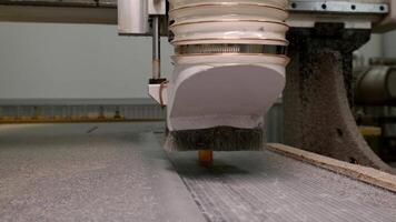 Programmable polishing device processes the surface of a substantial metal component, ensuring it achieves the desired level of uniformity. video
