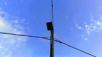 A pole with wires and a light on it video