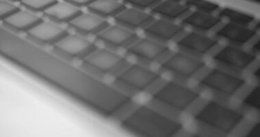 A blurry photo of a laptop keyboard video