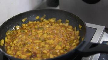 Girl blogger prepares pear cake filling Pear Caramel take take pictures blog boiling fruit in syrup. making jam from yellow pears at home. video